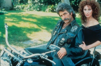Sam Elliott with Cher on a bike in the movie Mask. 