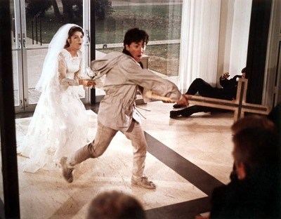 Katharine Ross in a wedding dress chasing after Dustin Hoffman in The Graduate. 