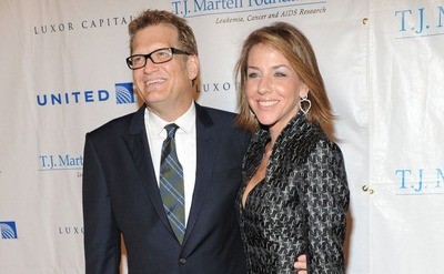 Drew Carey and his wife Nicole Jaracz are attending an event together.