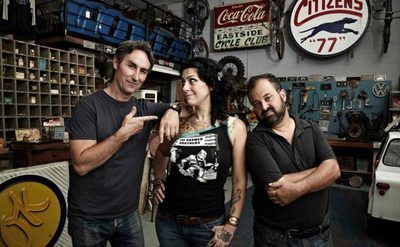 Danielle Colby with Frank and Mike in the garage 