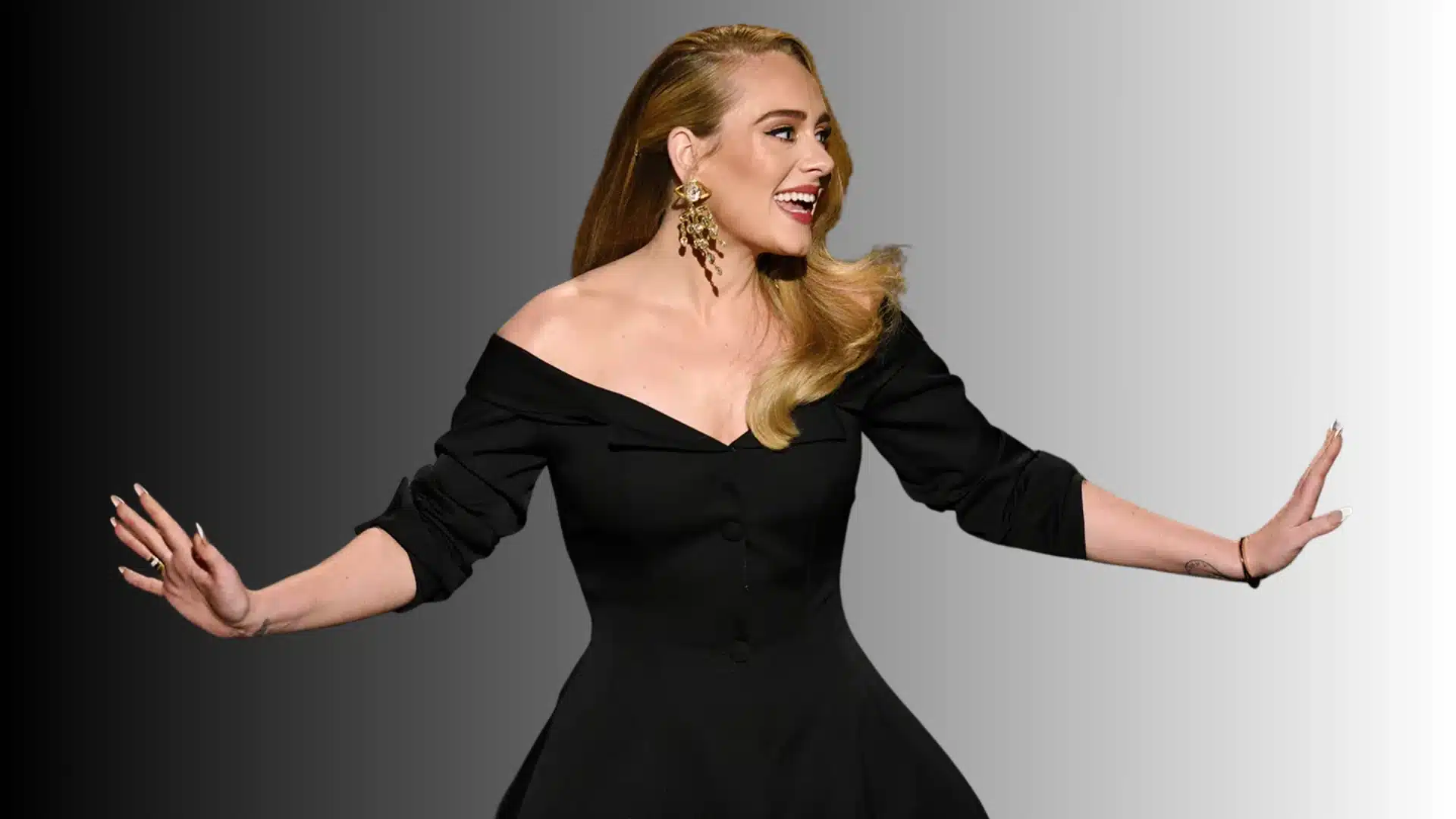 Adele, dressed in a black off-shoulder gown and large dangling earrings showing how did Adele lose weight