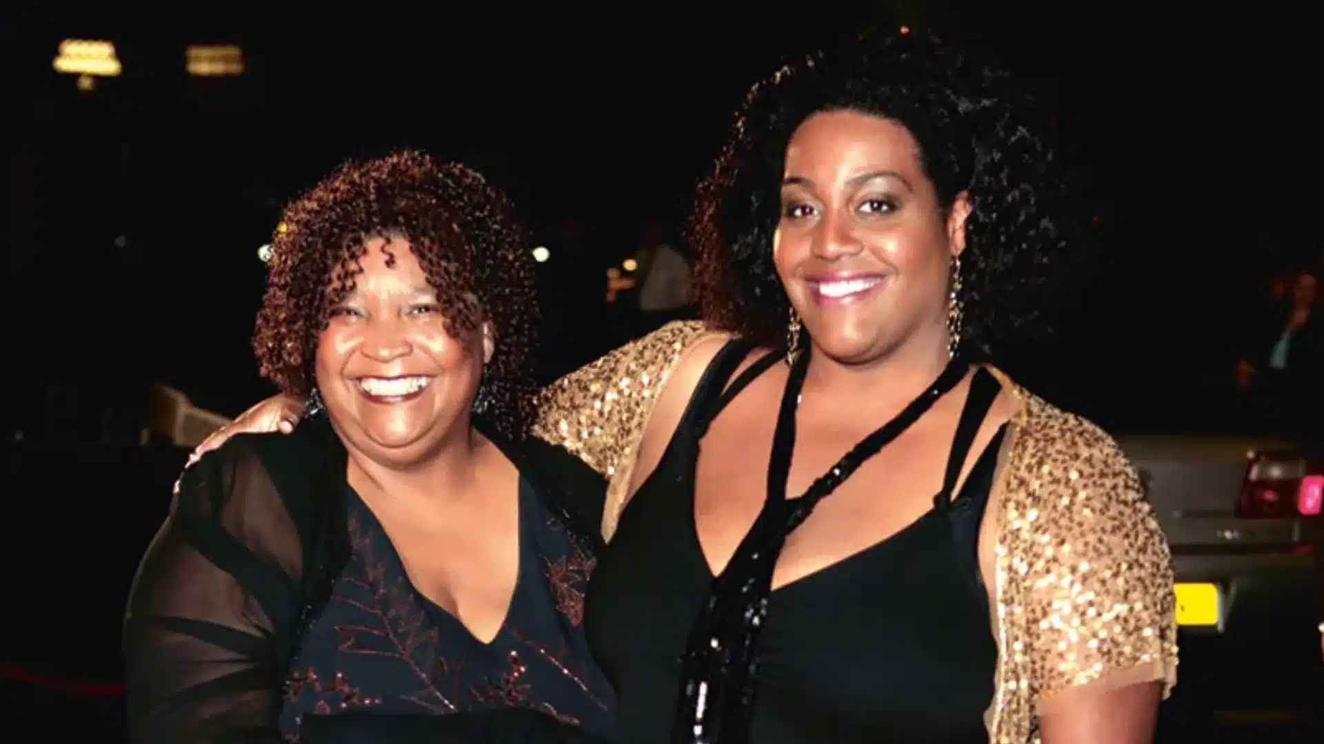 Alison Hammond and her mother pose closely together at a nighttime event