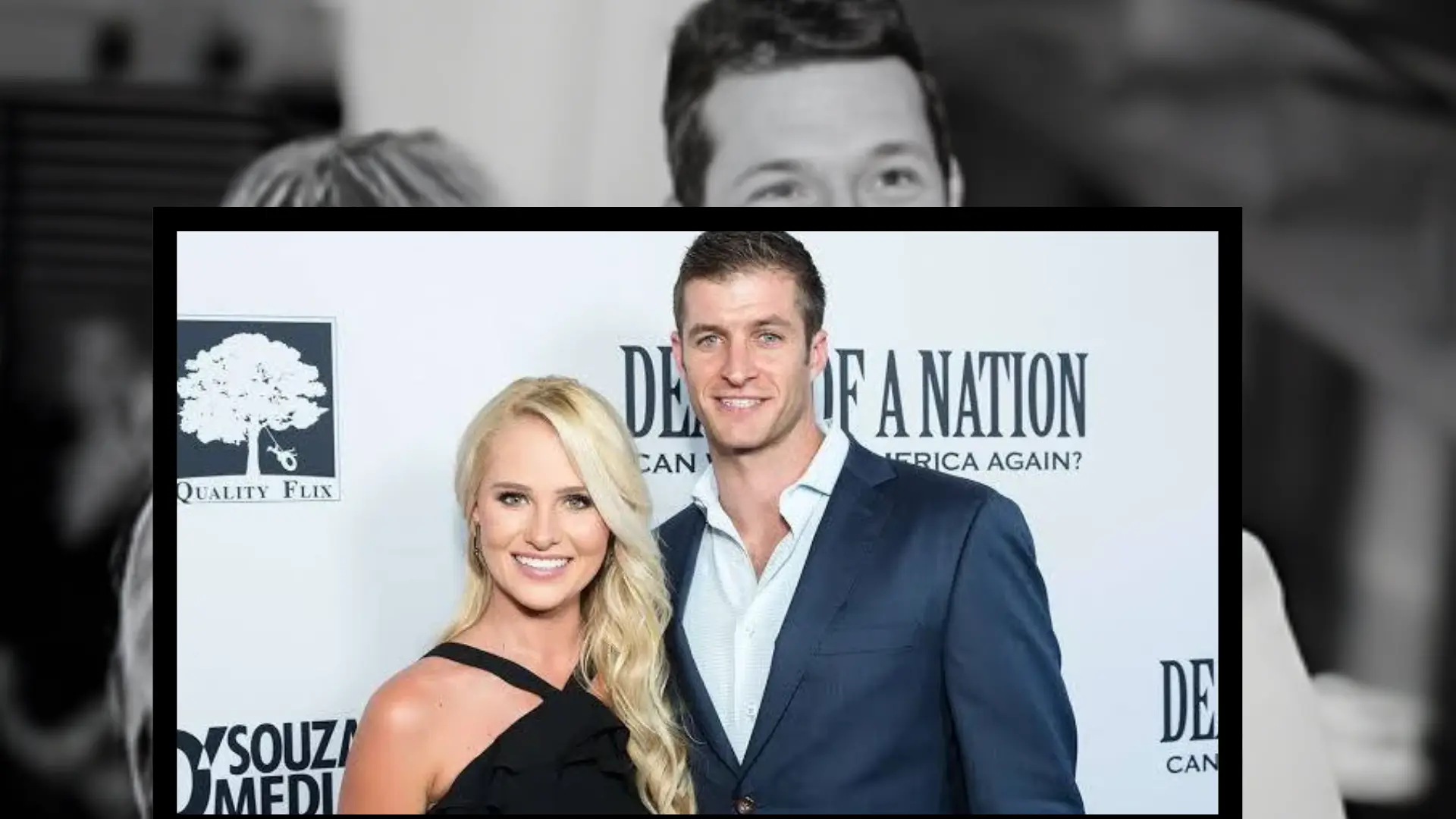 Tomi Lahren and her husband smile together on a red carpet in front of a white backdrop for the film Death of a Nation