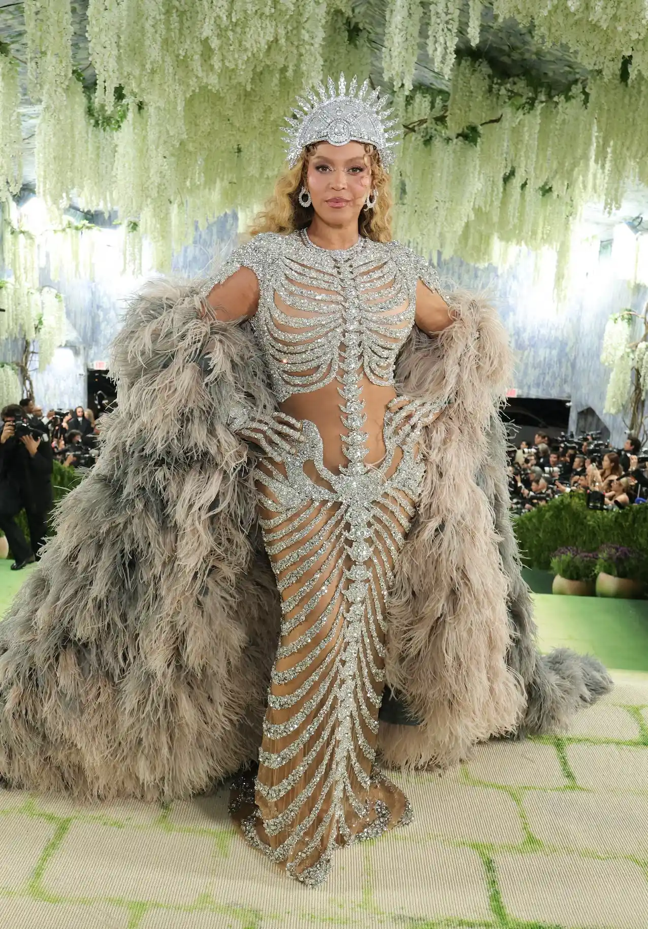 Beyoncé poses in a skeleton inspired Olivier Rousteing gown with crystals and a massive feathered train (1)