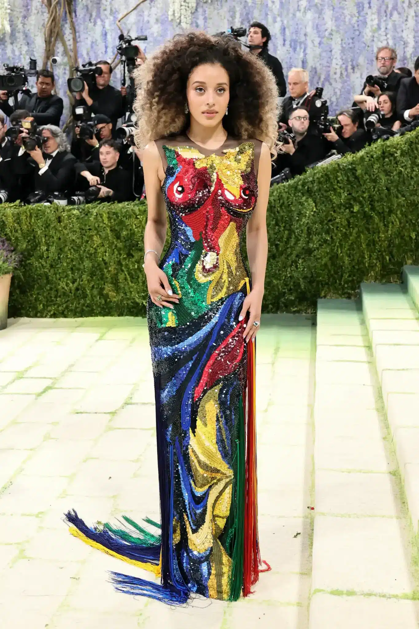 Chase poses in an Alexander McQueen gown with over a million sequins mimicking colorful brushstrokes (1)